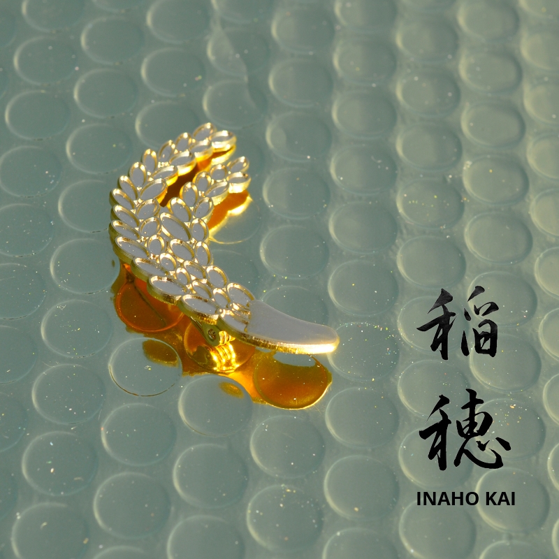 INAHO-KAI Brosche Petra Stelzmüller Karatedo Doshinkan Reisähre Idee Umsetzung Design Tradition Japan Kunst Karateverein